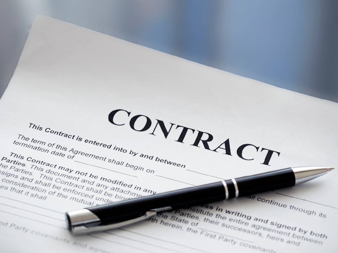 Close up of a contract with black pen